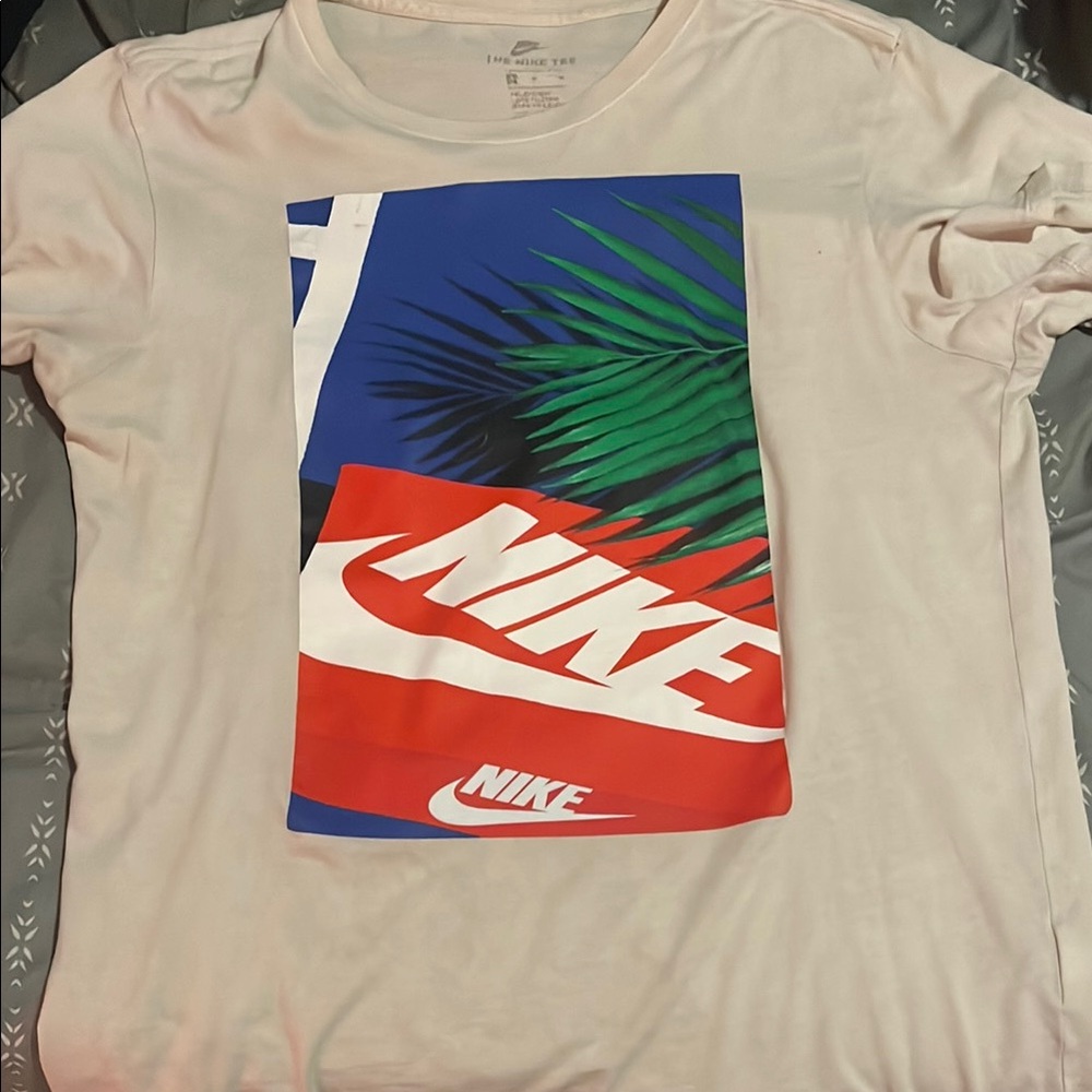 The Nike TEE with a Nike shoebox graphic